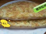 烙饼粘鸡蛋。